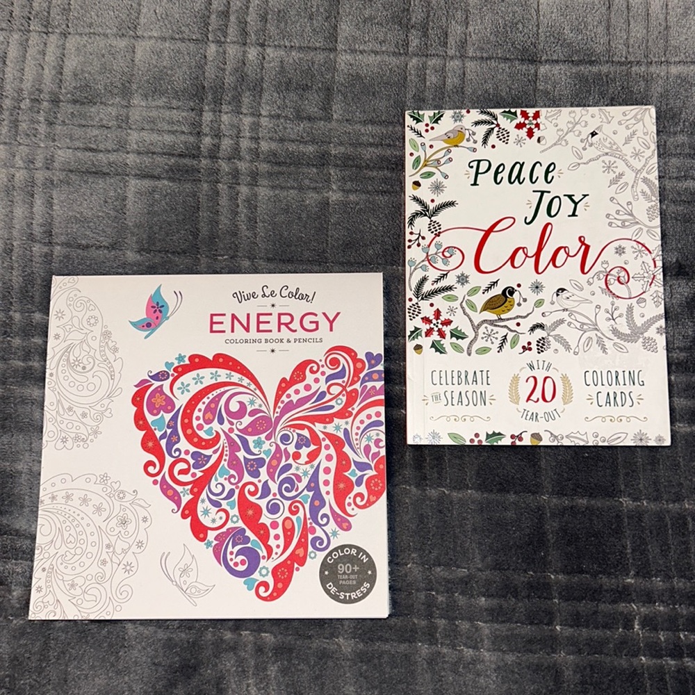 2 adult coloring books.